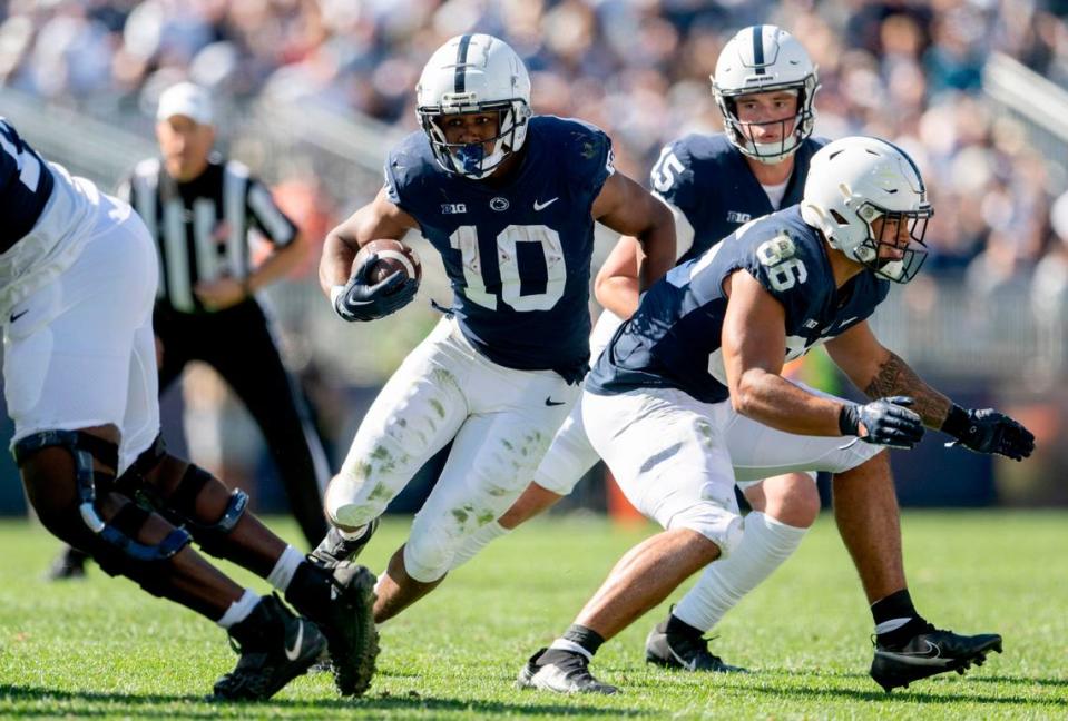 Penn State running back Nicholas Singleton runs with the ball during the game on Saturday, Sept. 24, 2022.