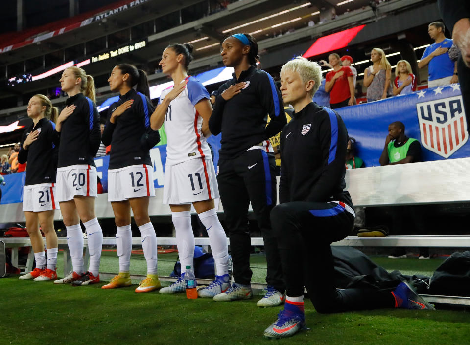 ATLANTA, GA - SEPTEMBER 18:  Megan Rapinoe #15 kneels during the National Anthem prior to the match between the United States and the Netherlands at Georgia Dome on September 18, 2016 in Atlanta, Georgia.  (Photo by Kevin C. Cox/Getty Images)
