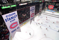 FILE - This Feb. 22, 1996, file photo shows some of the banners hanging from the rafters of the Montreal Forum marking the 24 Stanley Cup victories of the Canadiens, in Montreal. The Montreal Canadiens bid to end Canada's Stanley Cup drought brings back memories of the building in which they last won the title in 1993. The Montreal Forum still stands, but it's significance is beginning to fade. (AP Photo/Canadian Press via AP)