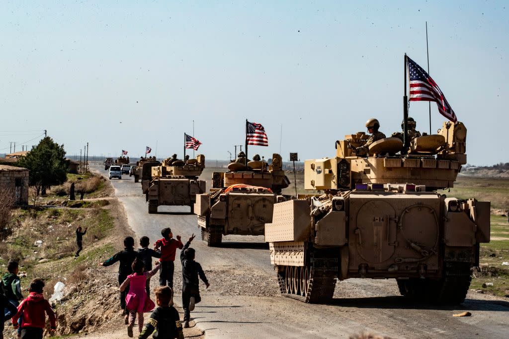 US Bradley Fighting Vehicles patrol in the Suwaydiyah oil fields in Syria's northeastern Hasakah province on February 13.