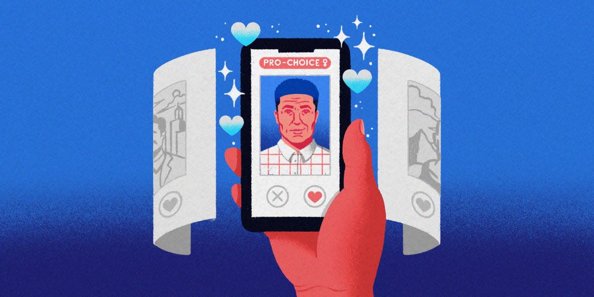 Okcupid profile on smartphone with other profiles orbiting it