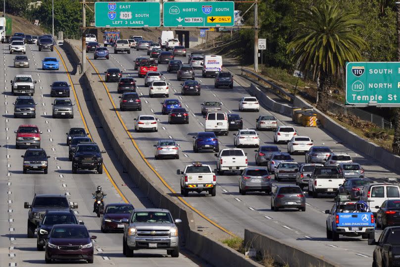 Cars drive on the Hollywood Freeway (U.S. 101) in Los Angeles, April 2020