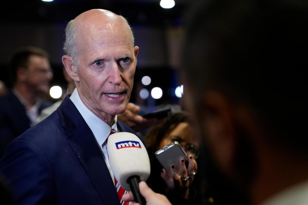 PHOTO: Sen. Rick Scott, R-Fla., speaks to reporters in the spin room before a presidential debate between Republican presidential nominee former President Trump and Democratic presidential nominee Vice President Harris, Sept. 10, 2024, in Philadelphia. (Matt Rourke/AP)