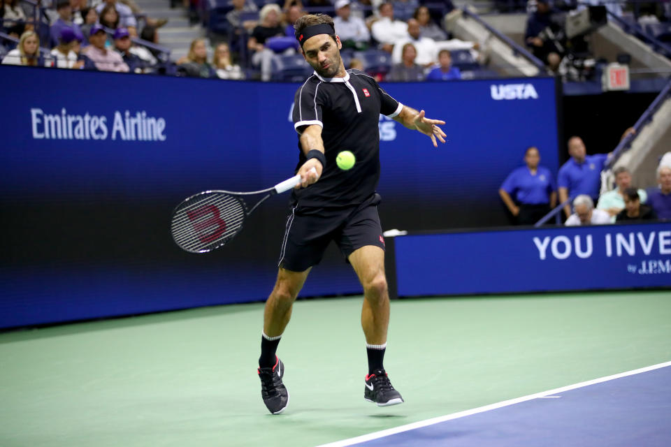 Roger Federer of Switzerland returns a shot against Sumit Nagal of India during their Men's Singles first round match Monday at the U.S. Open in New York.