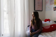 Scarlett Goddard Strahan, 11, sits for a portrait at her home on Tuesday, Aug. 20, 2024, in Sacramento, Calif. (AP Photo/Juliana Yamada)