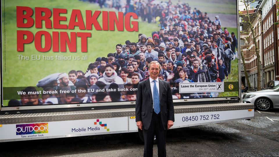 Former UKIP leader Nigel Farage poses with the party's infamous "Breaking Point" poster on June 16, 2016, ahead of the UK's referendum on leaving the EU. - Jack Taylor/Getty Images