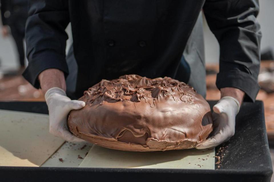 The giant chocolate candies placed in the Russell Stover gift box weighed from 11 to 38 pounds each.