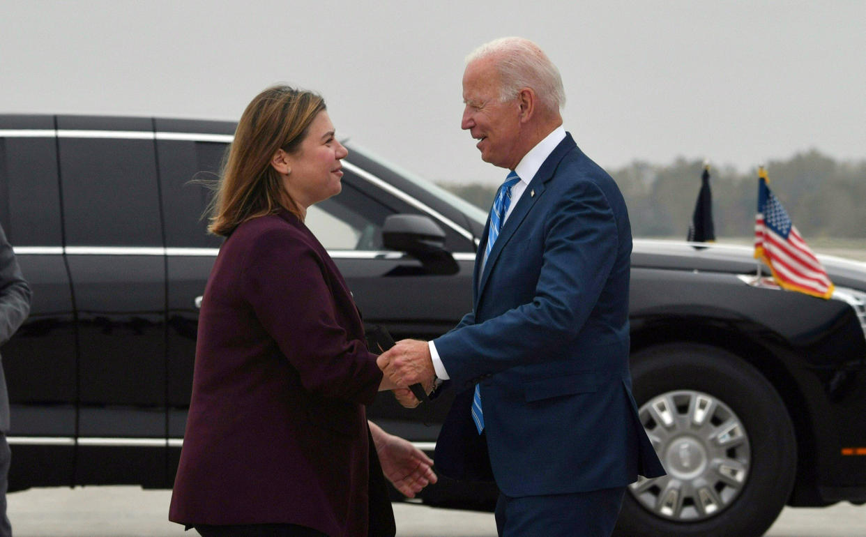 Rep. Elissa Slotkin greets President Biden upon arrival at Capital Region International Airport in Lansing, Michigan, on October 5, 2021. (Getty Images)