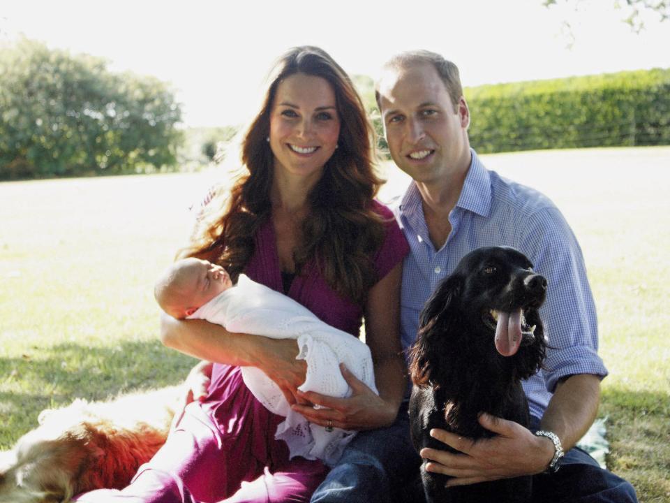 William, Kate, and Prince George pose at the Middleton family home.