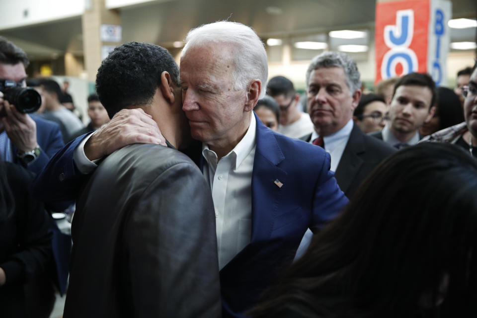 Former Vice President and Democratic presidential candidate Joe Biden embraces a supporter at a campaign event Saturday, Jan. 11, 2020, in Las Vegas. (AP Photo/John Locher)