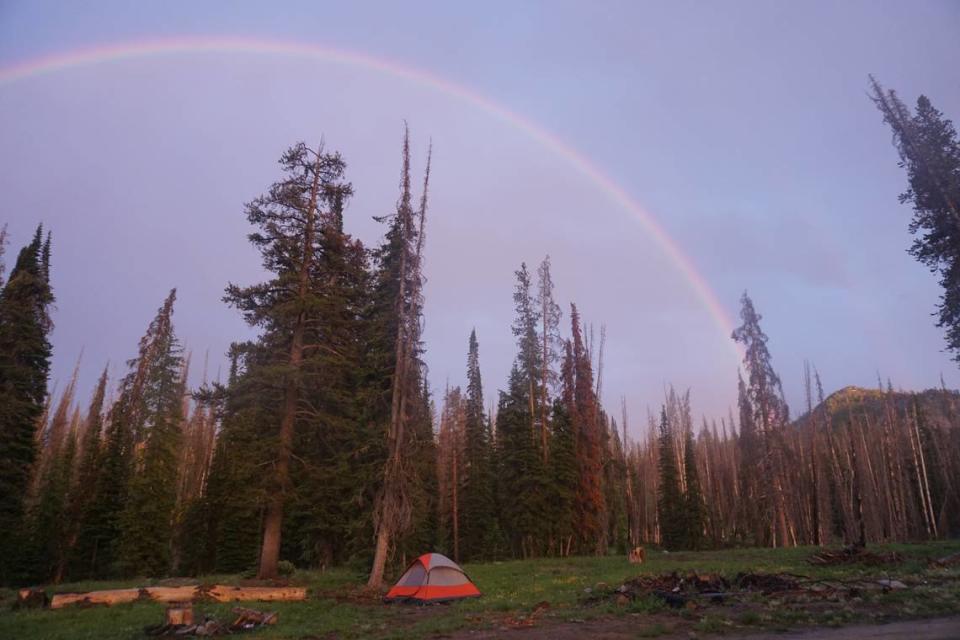 A rainbow is visible over outdoor reporter Nicole Blanchard’s tent near Big Trinity Lake in 2019. The Big Trinity Lake Campground isn’t slated to open until July.