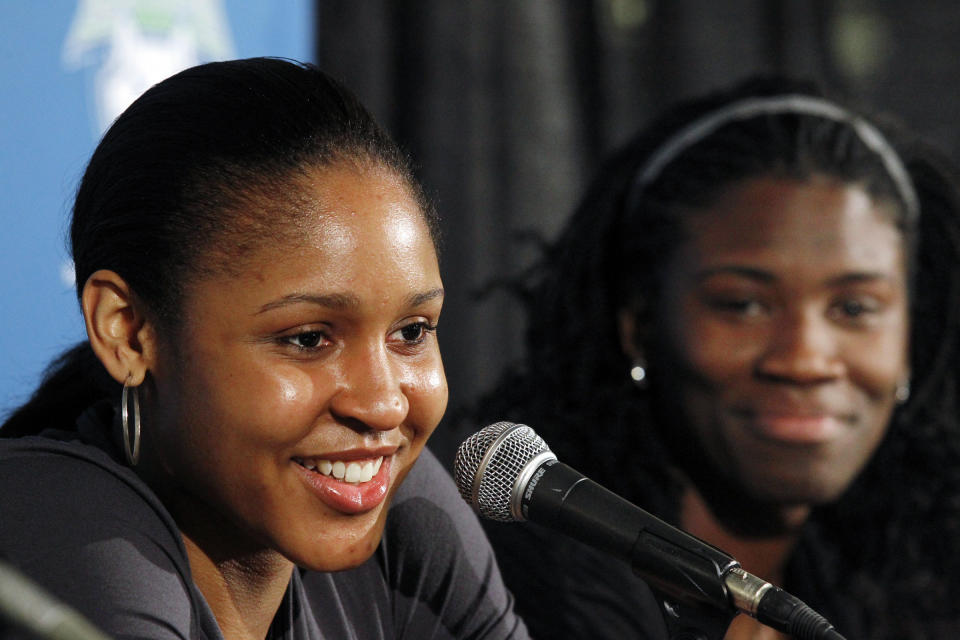 Minnesota Lynx first-round draft picks Maya Moore, left, and Amber Harris talk to reporters, April 12, 2011, in Minneapolis, the day after the WNBA basketball draft. Moore has officially decided to retire from playing basketball, making her announcement on “Good Morning America” on Monday, Jan. 16, 2023. (Jerry Holt/Star Tribune via AP, file)