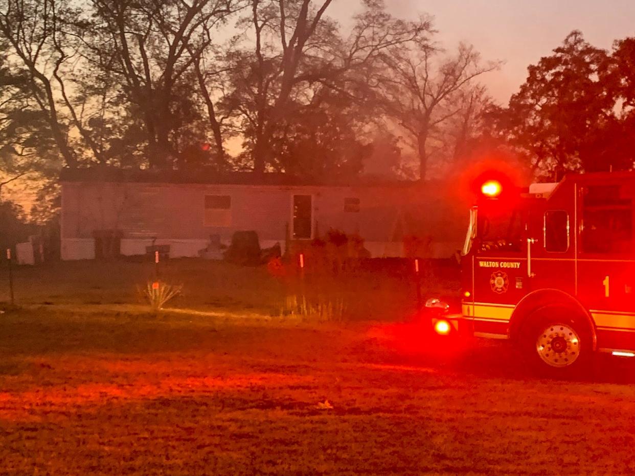 Walton County Fire Rescue crews battle a blaze at a mobile home on Hemphill Road in Gaskin on Wednesday. All residents and pets made it out safely.