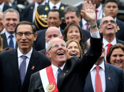 FILE PHOTO: Peru's President Pedro Pablo Kuczynski accompanied by Vice-President Martin Vizcarra (R) walks to the Government Palace during celebrations of Independence Day, in Lima, Peru, July 28, 2017. REUTERS/Guadalupe Pardo/File Photo