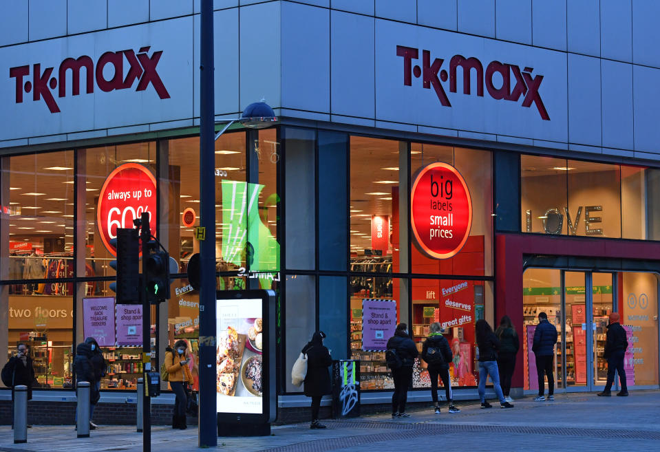 People queueing outside T.K.Maxx in Birmingham on the first day shops re-open after the second national lockdown ends and England has a strengthened tiered system of regional coronavirus restrictions.