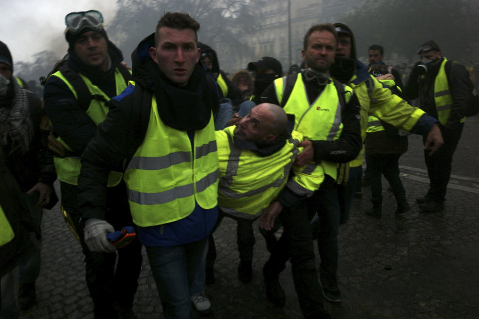 Protesters wearing yellow vests demonstrate on the Champs Elysees on Dec. 1, 2018, in Paris. (Photo: Antoine Gyori/Corbis via Getty Images)