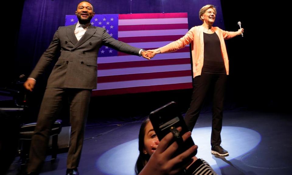 Warren at a rally with celebrity supporter John Legend in Charleston.