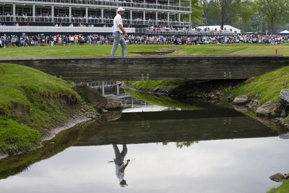 Scottie Scheffler walks on the sixth hole during the second round of the PGA Championship golf tournament at Oak Hill Country Club on Friday, May 19, 2023, in Pittsford, N.Y. (AP Photo/Abbie Parr)