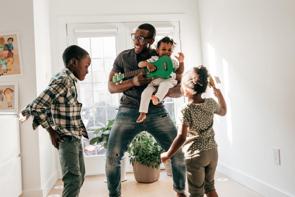 family playing in the house