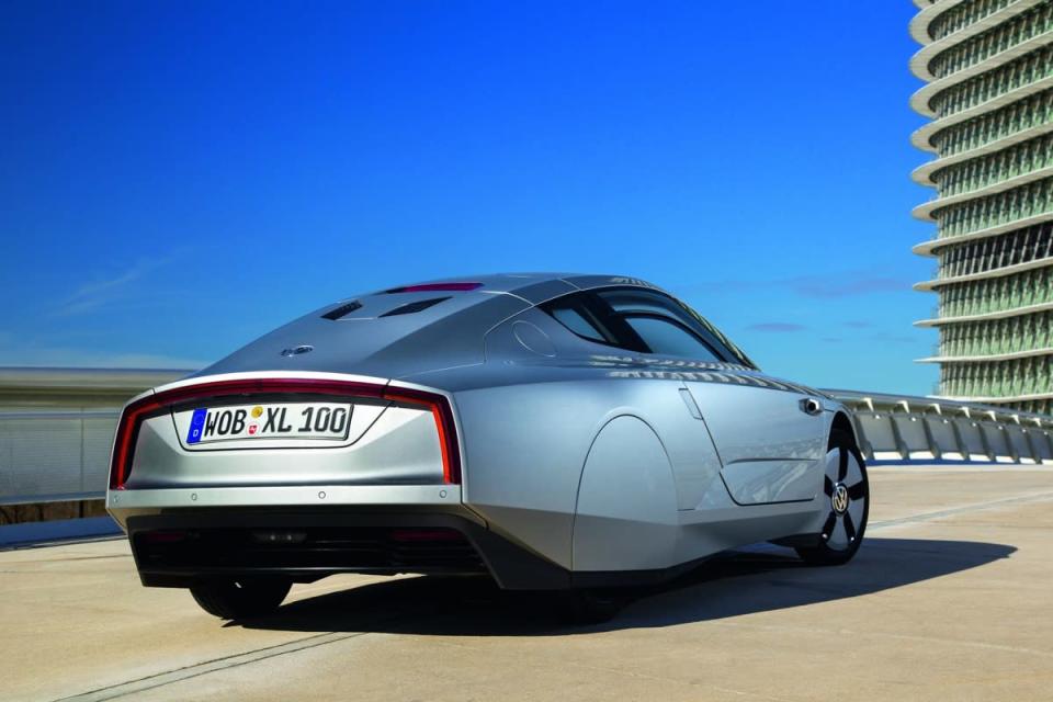 The Volkswagen XL1 with its super sleek design is powered by a miniscule 800cc diesel engine and a separate electric motor and battery pack.