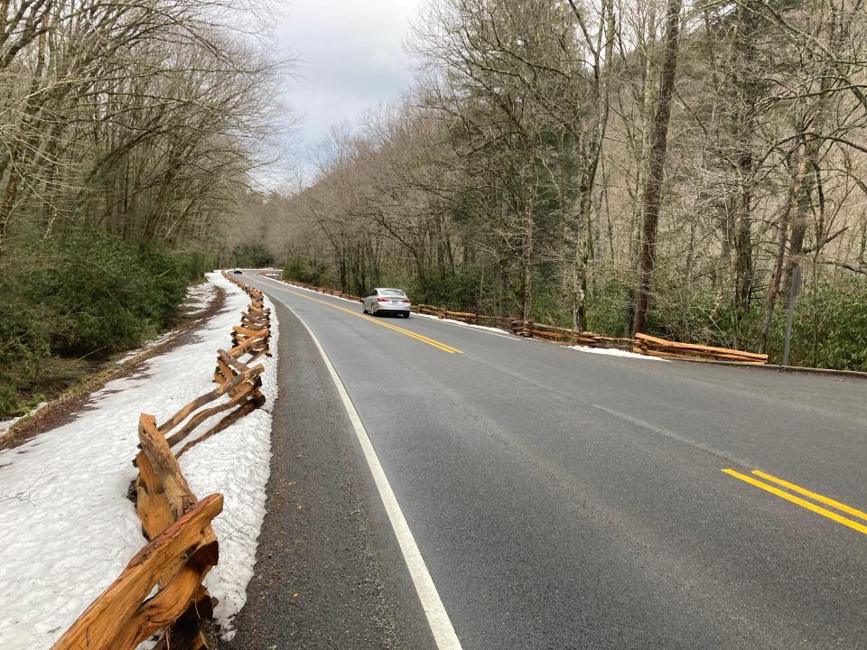 Split-rail parking barriers line both sides of Newfound Gap Road (U.S. Highway 441) near the Alum Cave trailhead in preparation for the new parking permit system that takes effect Wednesday.