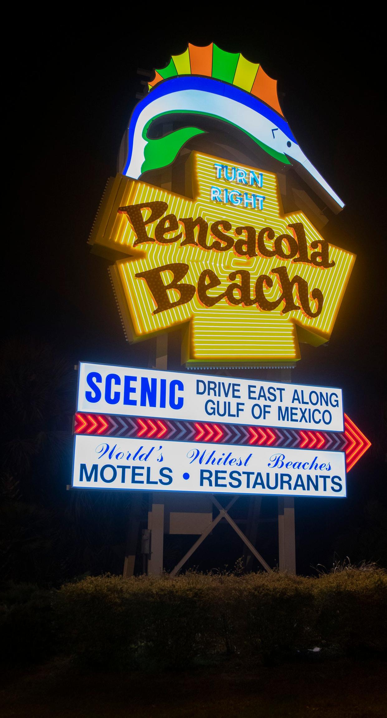 The iconic sailfish sign lights the way to Pensacola Beach on Thursday, Jan. 26, 2023. Plastic Arts Sign Company of Pensacola built the newest version of the sign to replace the last marquee after it received extensive damage during hurricane Sally. 