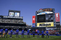 A memorial to baseball great Tom Seaver is held before a baseball game between the New York Mets and the Miami Marlins Thursday, April 8, 2021, in New York. (AP Photo/John Minchillo)