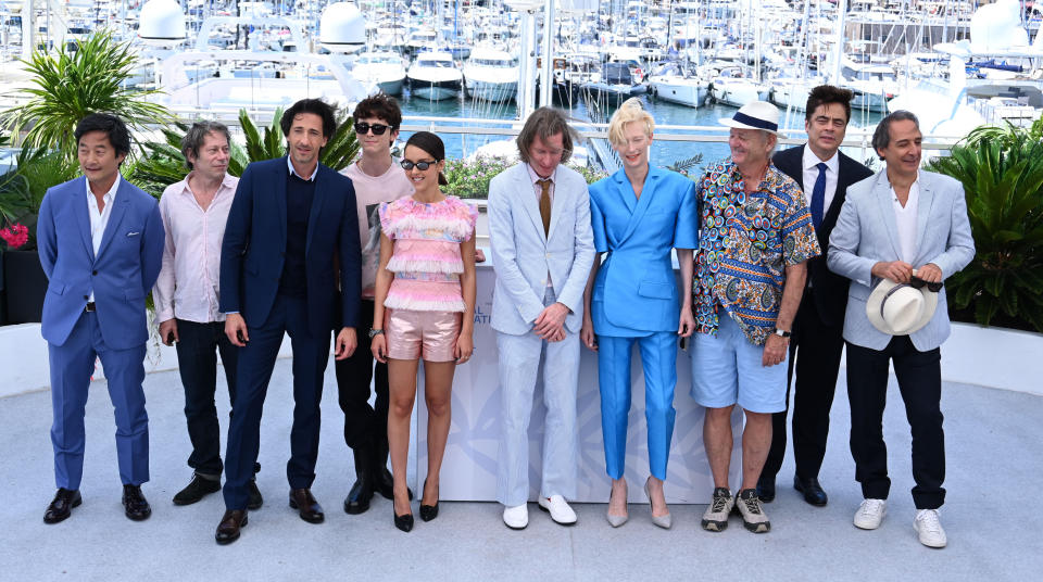 CANNES, FRANCE - JULY 13: (L to R) Us comedian Stephen Park, French actor Mathieu Amalric, Us actor Adrien Brody, French-Us actor Timothee Chalamet, French-Algerian actress Lyna Khoudri, Us director Wes Anderson, British actress Tilda Swinton, Us actor Bill Murray, Us actor Benicio Del Toro and French music composer Alexandre Desplat pose during a photocall for the film 