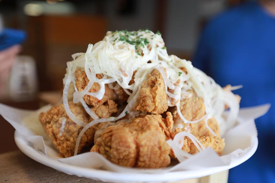 Chicken with onions at CM Chicken, also known as Choong Man Chicken, at the restaurant's 1132 Henderson Road location.