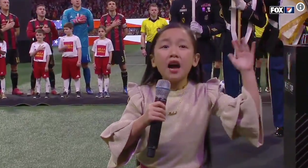 Seven-year-old singer rocks national anthem