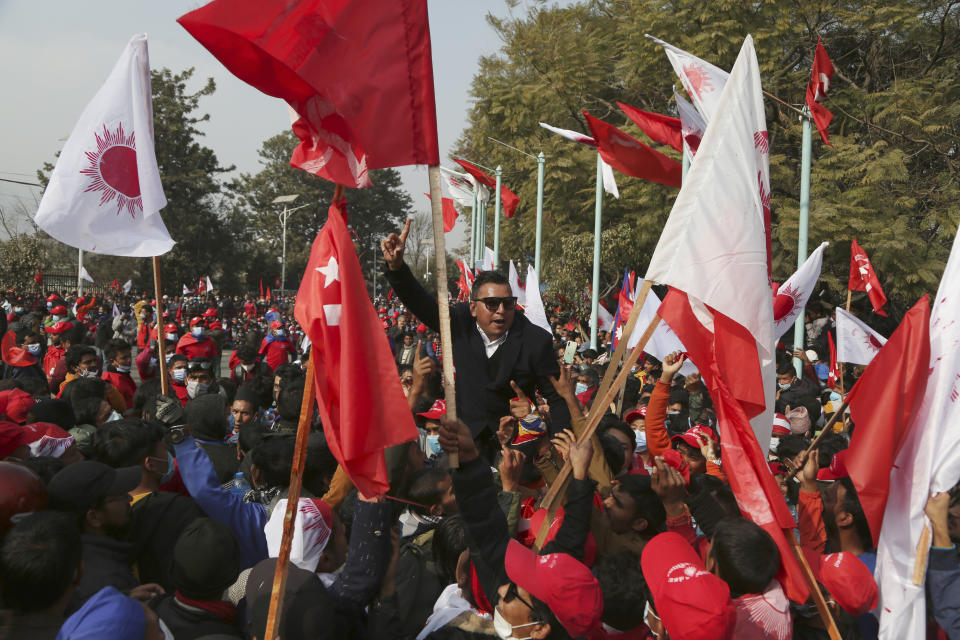 Nepalese supporters of the splinter group in the governing Nepal Communist Party participate in a protest in Kathmandu, Nepal, Friday, Jan. 22, 2021. Thousands of demonstrators rallied in Nepal’s capital Friday protesting against the prime minister who had dissolved the parliament and ordered fresh election because of feuds within the ruling political party. (AP Photo/Niranjan Shrestha)