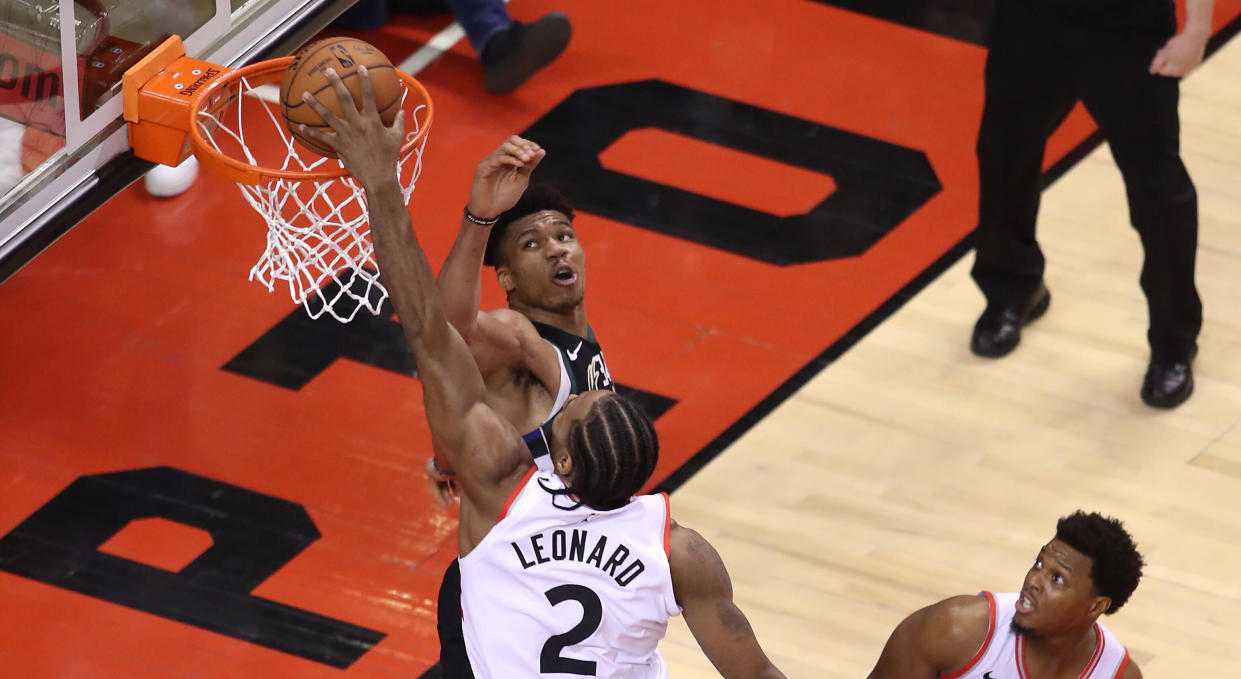 Toronto's Kawhi Leonard provided the highlight of the Raptors series-clinching win over the Milwaukee Bucks with this dunk on Giannis Antetokounmpo. (Photo by Claus Andersen/Getty Images)