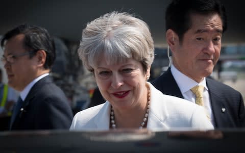 Prime Minister Theresa May arrives in Kyoto for a three day visit to Japan - Credit:  Stefan Rousseau/PA