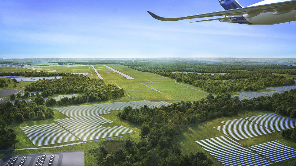 This artist rendering provided by Dominion Energy on Tuesday, Aug. 22, 2023, shows the Dulles Solar and Storage project, located in the southwest corner of Dulles International Airport in Dulles, Va. Travelers taking off and landing at Dulles International Airport outside the nation’s capital will soon see an array of 200,000 solar panels laid out near the runways, the largest renewable energy project ever built at a U. S. airport. Dominion Energy and the Metropolitan Washington Airports Authority ceremonially broke ground on the 835-acre project Tuesday. (Dominion Energy via AP)