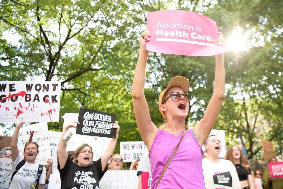 Demonstrators chant in Krutch Park in downtown Knoxville in support of abortion rights and in response to the the overturning of Roe v. Wade on June 24, 2022.