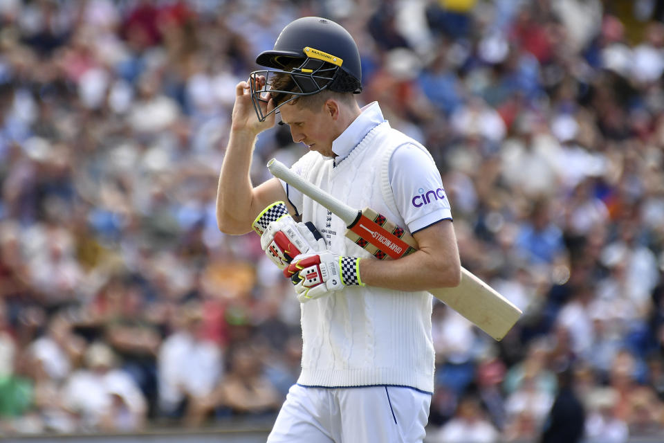 England's Zak Crawley leaves the pitch after being dismissed by Australia's Mitchell Marsh during the fourth day of the third Ashes Test match between England and Australia at Headingley, Leeds, England, Sunday, July 9, 2023. (AP Photo/Rui Vieira)