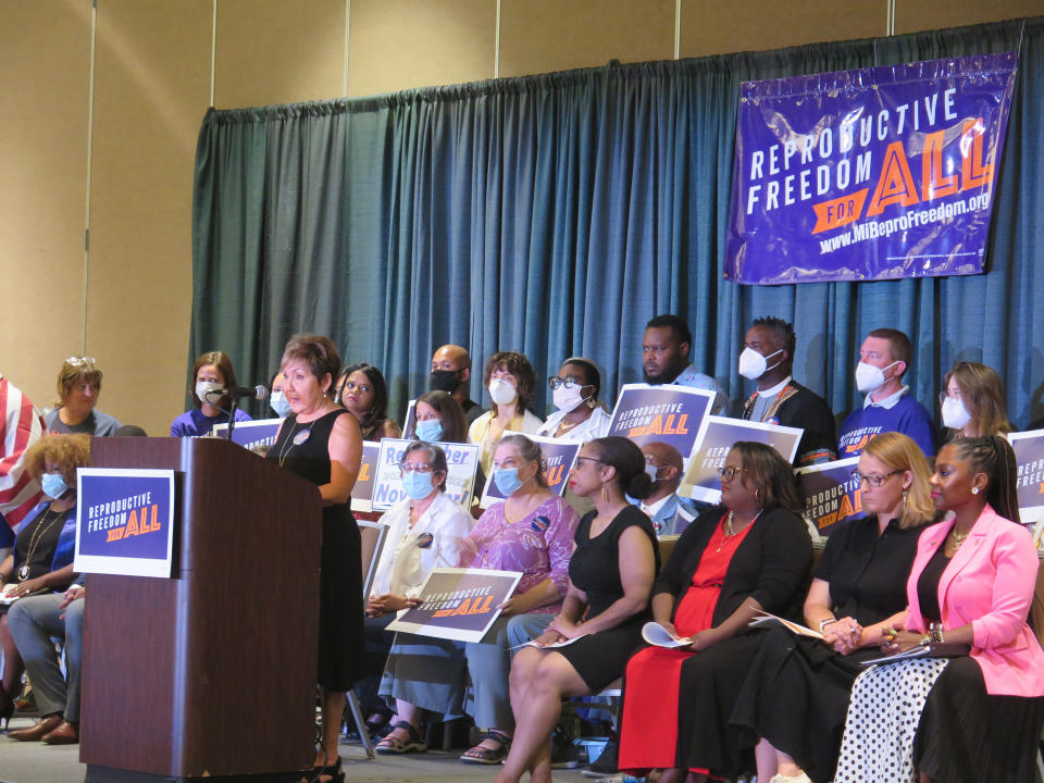 Renee Chelian, executive director of Northland Family Planning Centers joins Leaders of the Reproductive Freedom for All campaign as they speak to supporters on Monday, July 11, 2022, in Lansing, Mich., after turning in 753,759 signatures to qualify for Michigan's November ballot. (AP Photo/Joey Cappelletti)