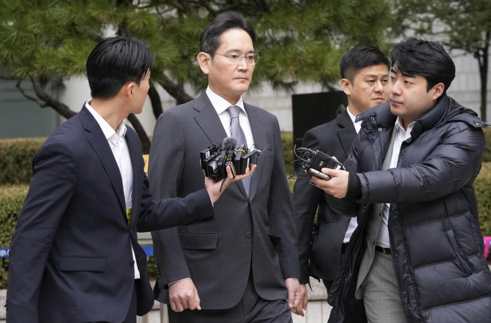 Samsung Electronics Chairman Lee Jae-yong, second from left, leaves the Seoul Central District Court in Seoul, South Korea, Monday, Feb. 5, 2024. A South Korean court acquitted Lee of financial crimes in relation to a contentious merger between two Samsung affiliates in 2015 that tightened his grip over South Korea’s biggest company. (AP Photo/Ahn Young-joon)