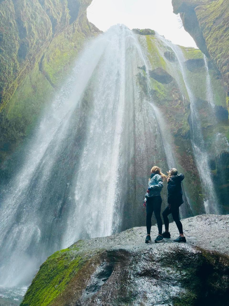 Jordan Carlyle and Christen Puckett at the Gljufrabui waterfall in Iceland.