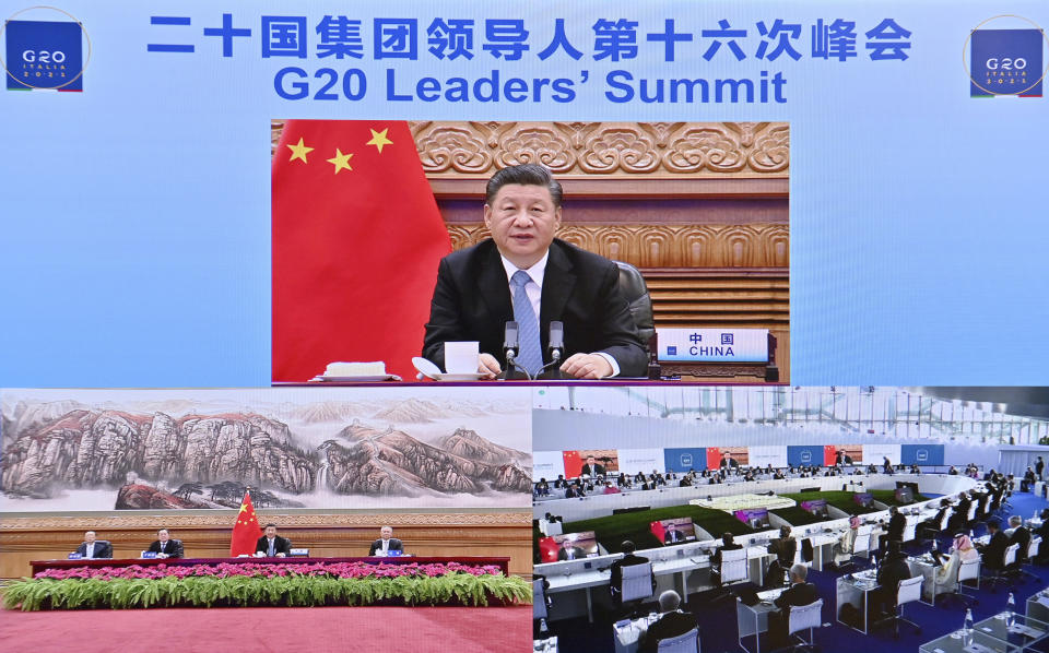 FILE - In this photo released by China's Xinhua News Agency, Chinese President Xi Jinping speaks via video link to leaders at the G20 Summit from Beijing, on Oct. 31, 2021. Chinese leader Xi Jinping is leaving his country's COVID bubble and venturing abroad next week for the G-20 meeting of industrial and emerging market nations in Indonesia followed by the Asia-Pacific Economic Cooperation summit in Thailand. The Chinese leader has relied mainly on speeches by video to deliver China's message at the U.N. and other forums since 2020. (Yue Yuewei/Xinhua via AP, File)