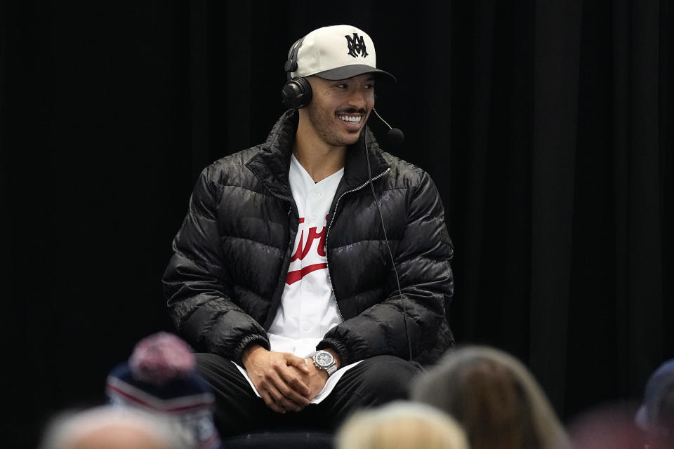 Minnesota Twins shortstop Carlos Correa speaks to fans and media during the team's annual fan fest at Target Field, Saturday, Jan. 28, 2023, in Minneapolis. (AP Photo/Abbie Parr)