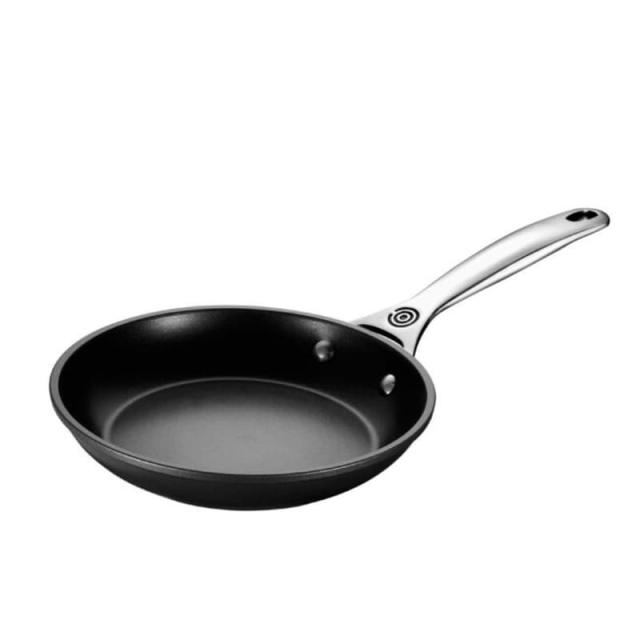 Le Creuset - A top pick from our Winter Savings Event, this 4.5 qt. Classic  Stainless Steel Wok is easy to use and exceptionally versatile. Head over  to our website to see