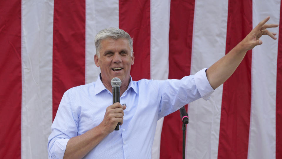 Utah State Rep. Phil Lyman, who is running for governor, speaks during a rally on June 14, 2024, in Orem, Utah. Lyman is best known for organizing an illegal ATV ride in 2014 to protest federal officials closing a southeast Utah canyon to motorized vehicles to protect Native American cliff dwellings, artifacts and burial sites. A judge in 2015 sentenced him to 10 days in jail and three years of probation after a jury found him guilty of misdemeanor illegal use of ATVs and conspiracy. Trump later pardoned him in December 2020. (AP Photo/Rick Bowmer)