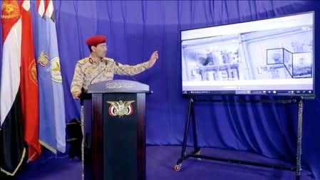 Yahya Saria, the Houthi military spokesperson, speaks during a televised speech in this still image taken from video