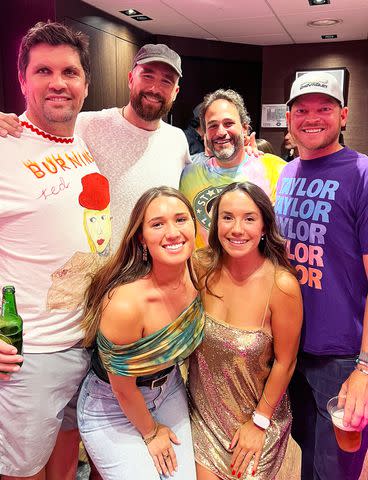 <p>Sam Riggs Bozoian/X</p> Sam Riggs Bozoian (right) poses with Travis Kelce (second from left) at Taylor Swift's Eras Tour