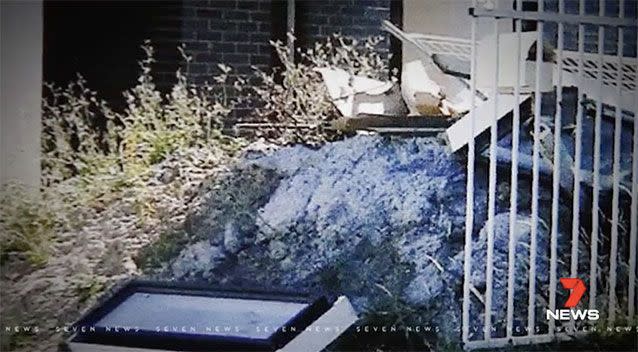 The items were removed from the kerbside rubbish collection, but were immediately replaced. Picture: 7 News