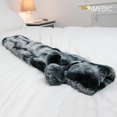 How cosy does this extra-long hot water bottle look? It's 20% off ATM.