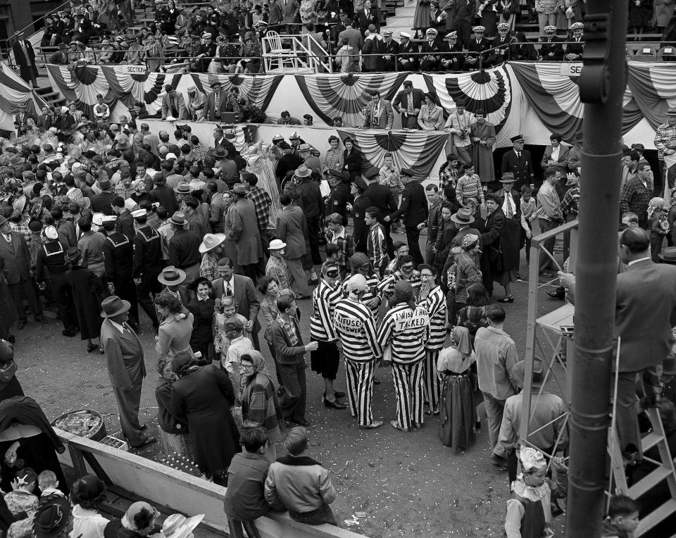 A group of Mardi Gras revelers wear striped jail clothing as they parade the streets of New Orleans, La. Feb. 6, 1951. The group capitalized on the recent hearing held by the Kefauver Senate Crime Investigation committee where local officials and club owners refused to answer questions and consequently threatened with contempt proceedings. The Kefauver senate crime investigation, led by Democratic Tennessee Senator Estes Kefauver, exposed and investigated organized crime. (AP Photo/Dave Tenenbaum, file)