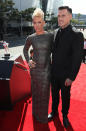 Pink, left, and Carey Hart arrive at the MTV Video Music Awards on Thursday, Sept. 6, 2012, in Los Angeles. (Photo by Matt Sayles/Invision/AP)