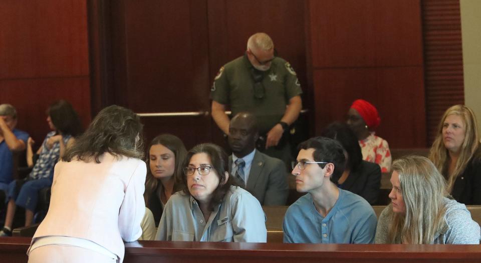 Assistant State Attorney Melissa Clark speaks with Joan Naydich, who was attacked by Matanzas High School student Brendan Depa, during a break in sentencing at the Kim C. Hammond Justice Center in Bunnell, Wednesday, May 1, 2024.